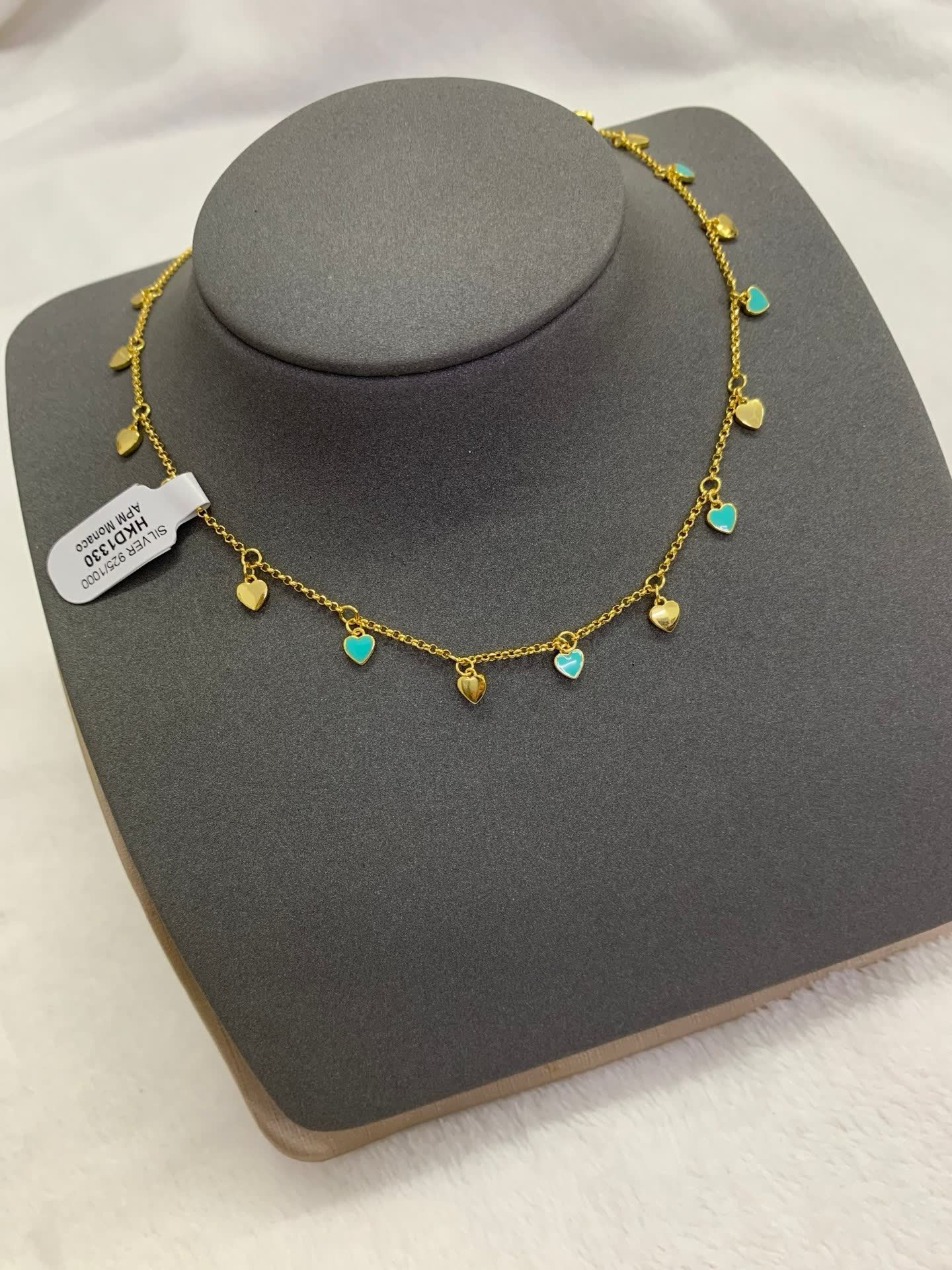 APM Monaco Gold Tone Blue Stone Heart Necklace